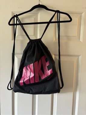 Nike Black Drawstring Backpack with Pink Logo